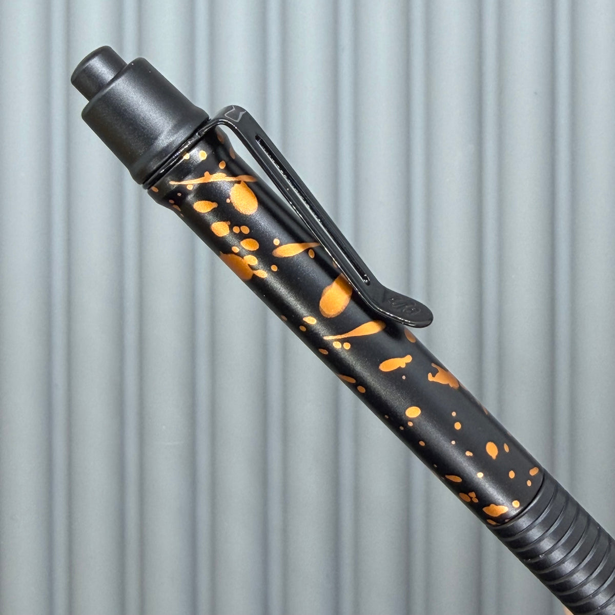 > Spoke Click Model C: Black with Orange Lava Splash, Aluminum / Black Aluminum Grooved Grip