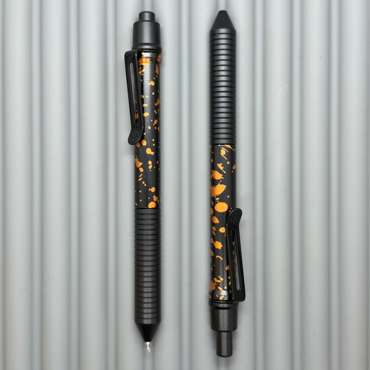> Spoke Click Model C: Black with Orange Lava Splash, Aluminum / Black Aluminum Grooved Grip