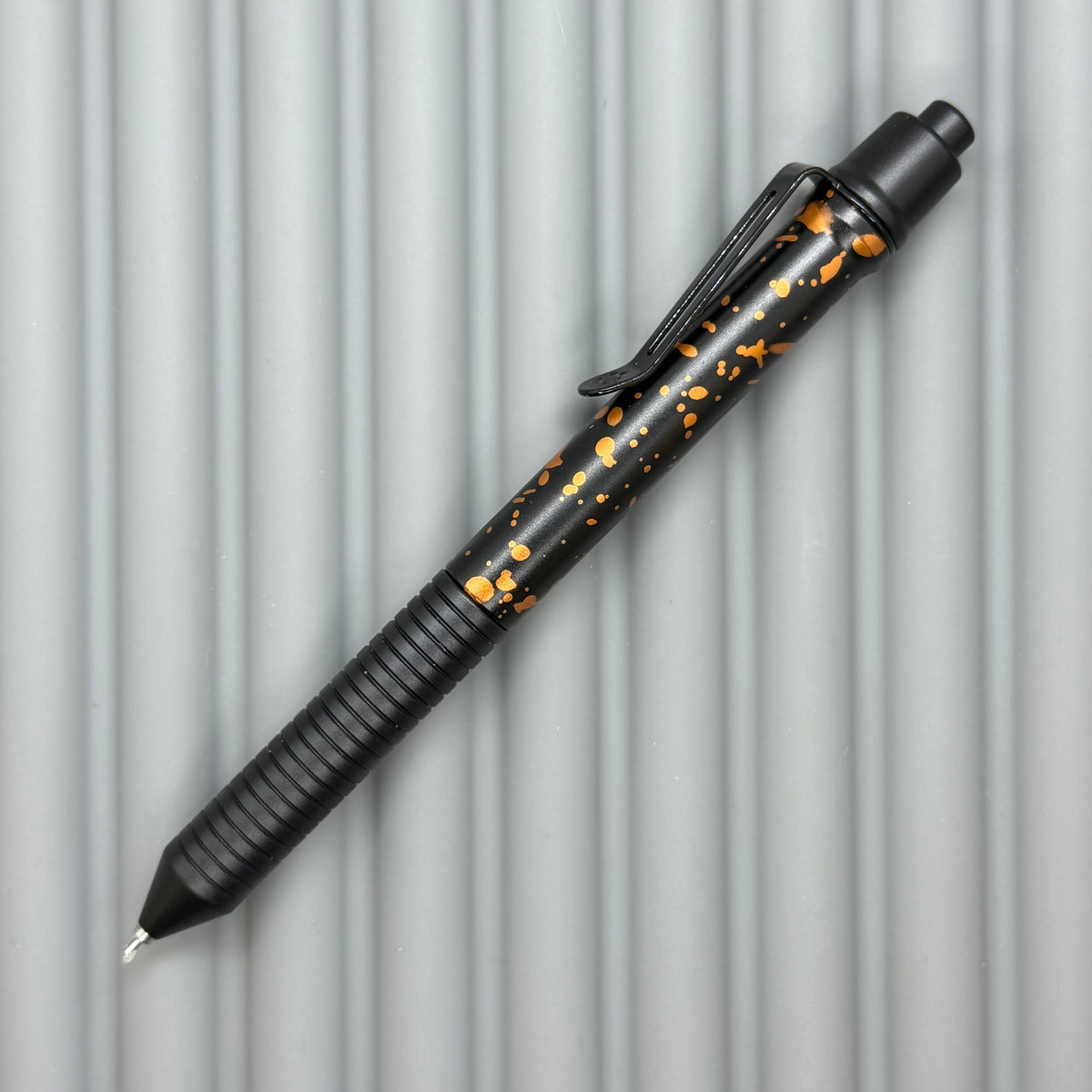 > Spoke Click Model C: Black with Orange Lava Splash, Aluminum / Black Aluminum Grooved Grip