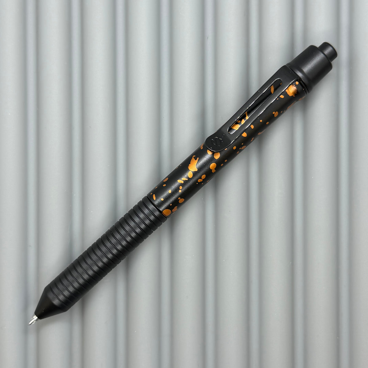 > Spoke Click Model C: Black with Orange Lava Splash, Aluminum / Black Aluminum Grooved Grip