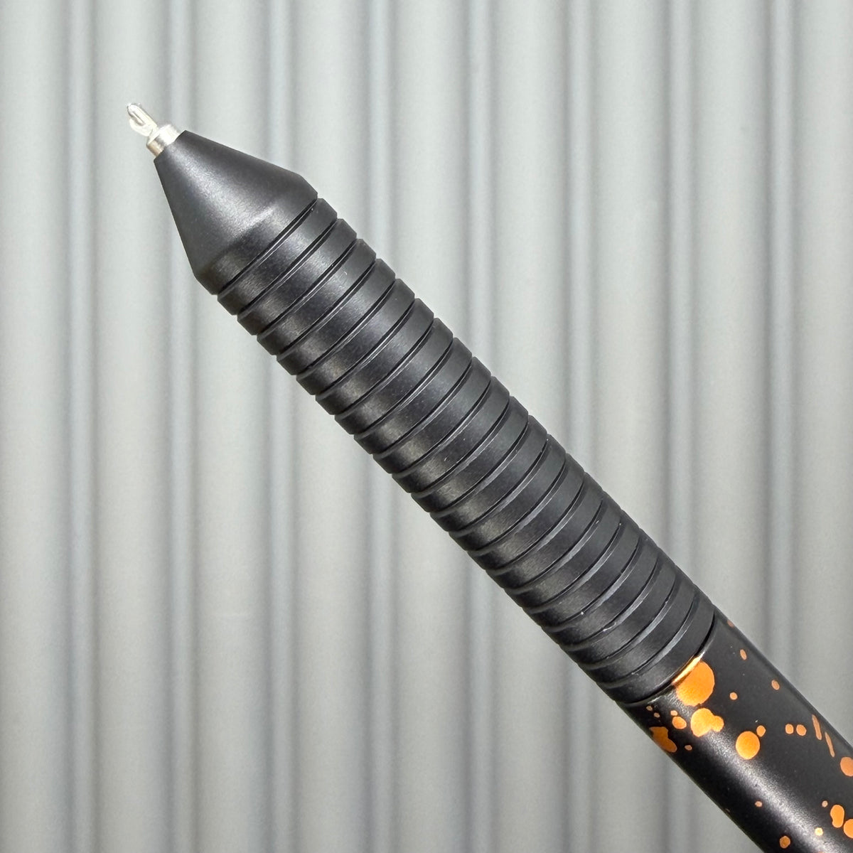 > Spoke Click Model C: Black with Orange Lava Splash, Aluminum / Black Aluminum Grooved Grip