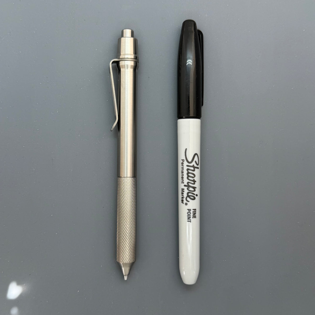 > Spoke Click Model C: Shiny Titanium / Flat Knurl Grip